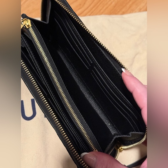 ***SOLD-••• Louis Vuitton Monogram Empreinte Leather
Black Zippy Wallet NEW - Picture 16 of 16